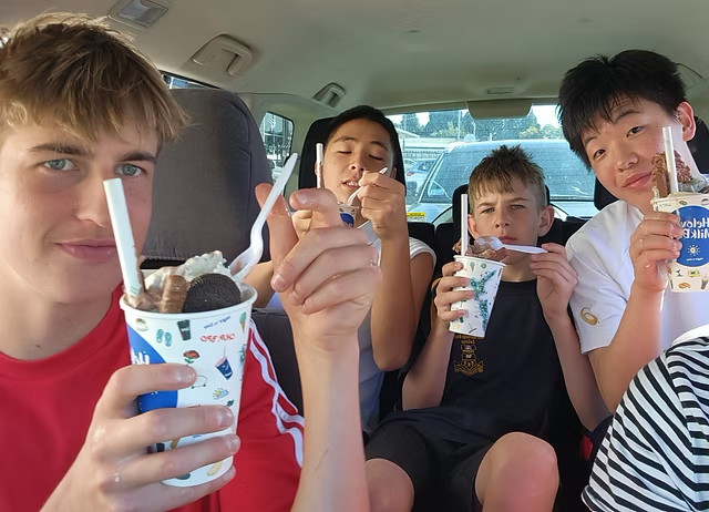 Host family and student enjoying ice cream